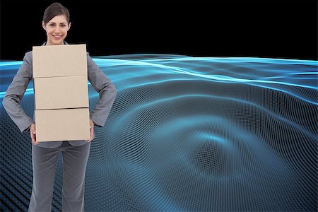 Composite image of smiling businesswoman carrying cardboard boxes Stock Photo - Budget Royalty-Free & Subscription, Code: 400-07191548