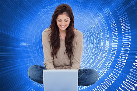 simsearch:400-07189587,k - Composite image of beautiful smiling brunette sitting on floor using laptop Stockbilder - Microstock & Abonnement, Bildnummer: 400-07191918