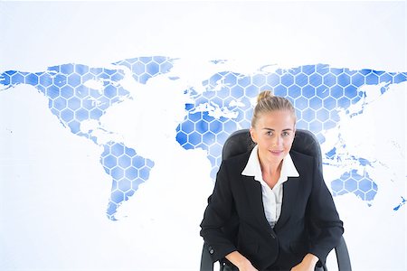 simsearch:400-07721096,k - Composite image of blonde businesswoman sitting on swivel chair with laptop Stockbilder - Microstock & Abonnement, Bildnummer: 400-07191935