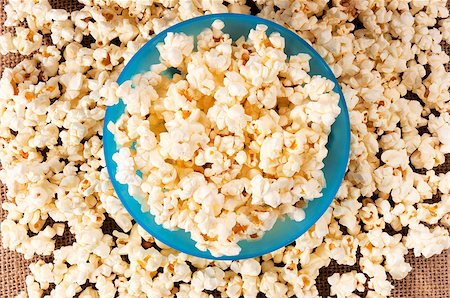 sweet and salty - Selective focus on the pop corn in cup Stock Photo - Budget Royalty-Free & Subscription, Code: 400-07206917