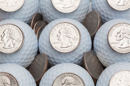 simsearch:400-07218310,k - White golf balls and US dollars Photographie de stock - Aubaine LD & Abonnement, Code: 400-07207302