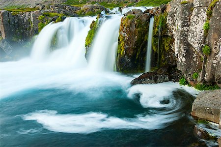 simsearch:400-07756743,k - Dynjandi is the most famous waterfall of the West Fjords and one of the most beautiful waterfalls in the whole Iceland. It is actually the cascade of waterfalls Foto de stock - Super Valor sin royalties y Suscripción, Código: 400-07207381