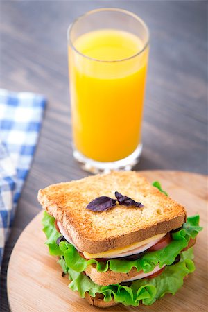 simsearch:400-07099478,k - Sandwich with ham, cheese, tomatoes and salad on toasted bread Stock Photo - Budget Royalty-Free & Subscription, Code: 400-07208001