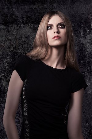simsearch:400-07223828,k - sensual blonde girl with Halloween style and dark creative make-up posing with long hair Fotografie stock - Microstock e Abbonamento, Codice: 400-07208033