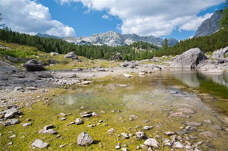 Double Lake at Triglav Lakes Valley, lake in the foreground, mountain range in the background. Stock Photo - Budget Royalty-Free & Subscription, Code: 400-07208095