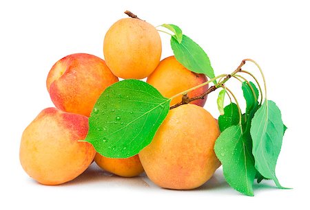 Apricots and leaf  white isolated. Studio shot Stock Photo - Budget Royalty-Free & Subscription, Code: 400-07208336