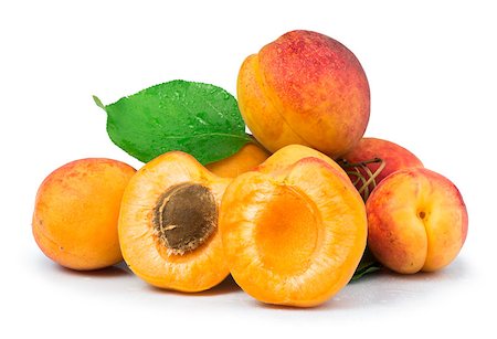 Apricots and leaf  white isolated. Studio shot Stock Photo - Budget Royalty-Free & Subscription, Code: 400-07208342