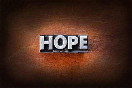 simsearch:400-07325569,k - The word hope made from vintage lead letterpress type on a leather background. Fotografie stock - Microstock e Abbonamento, Codice: 400-07208561