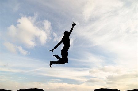 simsearch:400-07208717,k - man on top of the mountain reaches for the sun Photographie de stock - Aubaine LD & Abonnement, Code: 400-07208706