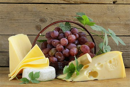 simsearch:400-05682309,k - cheeseboard (Maasdam, Roquefort, Camembert) and grapes for dessert Stock Photo - Budget Royalty-Free & Subscription, Code: 400-07208799