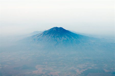 simsearch:400-04839330,k - Volcano top under sky with foggy valley, bird's eye view. Java island, Indonesia Photographie de stock - Aubaine LD & Abonnement, Code: 400-07208843