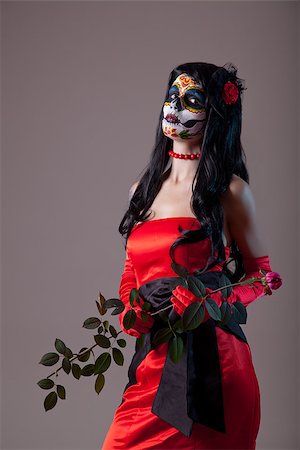 simsearch:400-07209176,k - Sugar skull girl in red evening dress, Halloween shot Photographie de stock - Aubaine LD & Abonnement, Code: 400-07209176