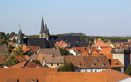 panorama of Quedlinburg, Germany. Quedlinburg is a town located north of the Harz mountains. In 1994 the medieval court and the old town was set on the UNESCO world heritage list. Foto de stock - Royalty-Free Super Valor e Assinatura, Número: 400-07209385