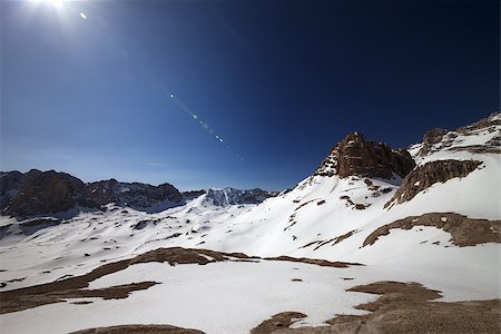 simsearch:400-09079917,k - Snowy plateau and blue sky with sun. Turkey, Central Taurus Mountains, Aladaglar (Anti-Taurus), plateau Edigel (Yedi Goller) Stockbilder - Microstock & Abonnement, Bildnummer: 400-07209431
