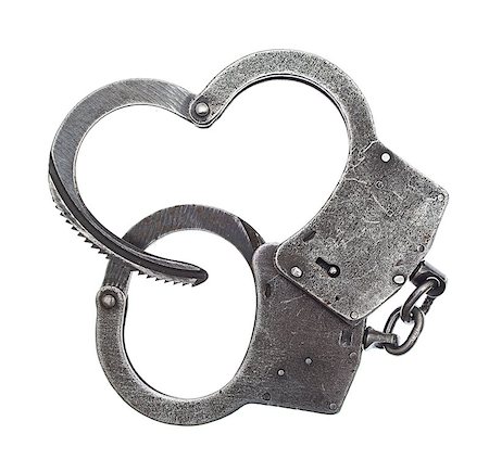 simsearch:400-05300234,k - handcuffs isolated on white background Fotografie stock - Microstock e Abbonamento, Codice: 400-07209456