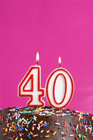 simsearch:400-05695717,k - A number candle is lit in celebration of forty years. Foto de stock - Super Valor sin royalties y Suscripción, Código: 400-07209526