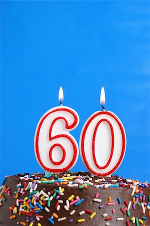 simsearch:400-05695717,k - A number candle is lit in celebration of sixty years. Foto de stock - Super Valor sin royalties y Suscripción, Código: 400-07209529