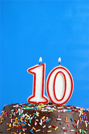 simsearch:400-05695717,k - A number candle is lit in celebration of ten years. Stock Photo - Budget Royalty-Free & Subscription, Code: 400-07209531