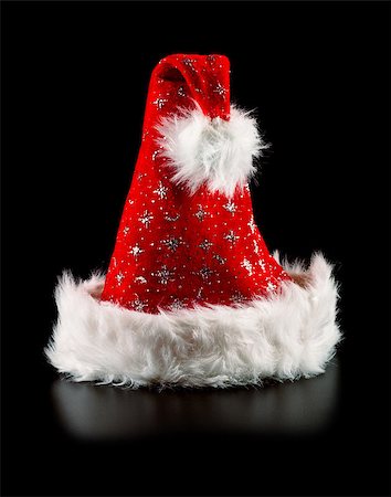 simsearch:400-04657079,k - santa hat with stars isolated on black Fotografie stock - Microstock e Abbonamento, Codice: 400-07209610