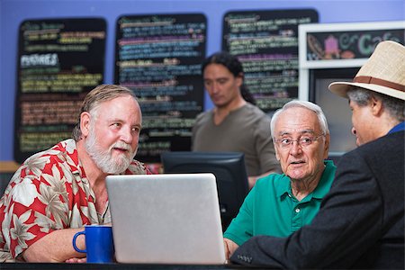 simsearch:400-07042113,k - Diverse group of mature men in cafe with laptop Stock Photo - Budget Royalty-Free & Subscription, Code: 400-07209740