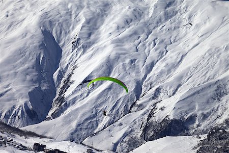 simsearch:400-05157183,k - Speed flying in winter mountains. Caucasus Mountains. Georgia, ski resort Gudauri. Photographie de stock - Aubaine LD & Abonnement, Code: 400-07215526