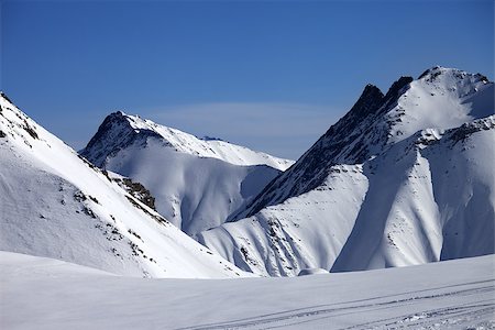 simsearch:400-08530488,k - Ski piste at nice winter day. Caucasus Mountains, Georgia, ski resort Gudauri. Stock Photo - Budget Royalty-Free & Subscription, Code: 400-07215528