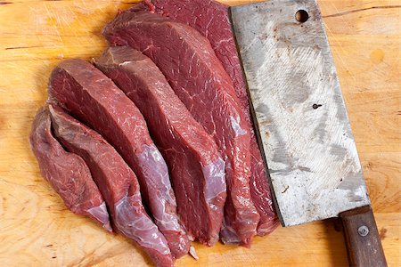 Detail of the slices of raw beef Foto de stock - Super Valor sin royalties y Suscripción, Código: 400-07216189