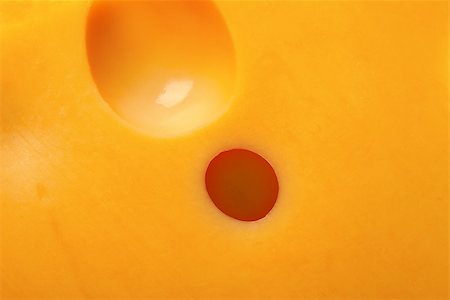 emmentaler cheese - Slice of cheese. Macro view. Stock Photo - Budget Royalty-Free & Subscription, Code: 400-07216418