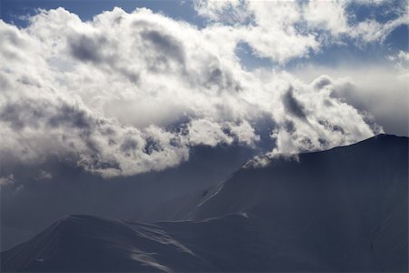 simsearch:400-07211845,k - Evening winter mountain in haze. View from ski resort Gudauri. Caucasus Mountains, Georgia. Stockbilder - Microstock & Abonnement, Bildnummer: 400-07216432