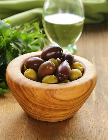 simsearch:400-07219392,k - marinated green and black olives (Kalamata) in a wooden bowl Stock Photo - Budget Royalty-Free & Subscription, Code: 400-07216795