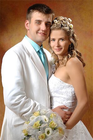 simsearch:400-04950359,k - Photo of bride and groom on their wedding day filming an expression of joy Stock Photo - Budget Royalty-Free & Subscription, Code: 400-07217447