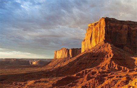 simsearch:400-05361560,k - Orange colours during sunrise in this iconic view of Monument Valley, USA Photographie de stock - Aubaine LD & Abonnement, Code: 400-07217850