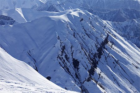 simsearch:400-09170509,k - View from ski slope on snowy rocks. Caucasus Mountains, Georgia, ski resort Gudauri. Photographie de stock - Aubaine LD & Abonnement, Code: 400-07217911