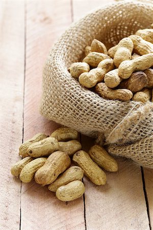 simsearch:400-07210943,k - peanuts nuts  in a bag on wooden table Stock Photo - Budget Royalty-Free & Subscription, Code: 400-07217968