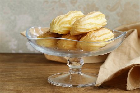 simsearch:400-04835290,k - choux pastry eclairs on glass stand base, festive dessert Stock Photo - Budget Royalty-Free & Subscription, Code: 400-07217984