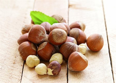 simsearch:400-06520688,k - heap hazelnuts (filberts) on wooden background Stock Photo - Budget Royalty-Free & Subscription, Code: 400-07217980