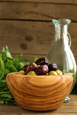 simsearch:400-07219392,k - marinated green and black olives (Kalamata) in a wooden bowl Stock Photo - Budget Royalty-Free & Subscription, Code: 400-07218112