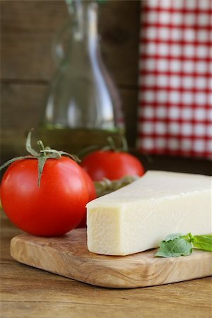 simsearch:400-07219392,k - piece of natural parmesan cheese on a wooden board Stock Photo - Budget Royalty-Free & Subscription, Code: 400-07218236