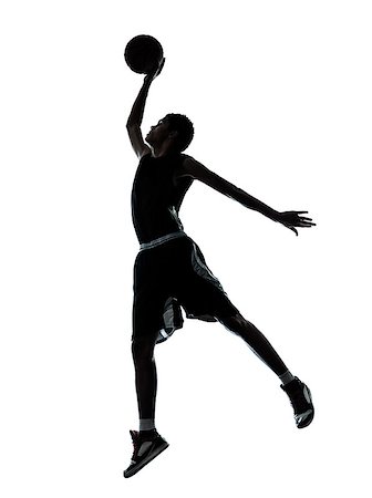 one young man basketball player dunking silhouette in studio isolated on white background Stock Photo - Budget Royalty-Free & Subscription, Code: 400-07218935