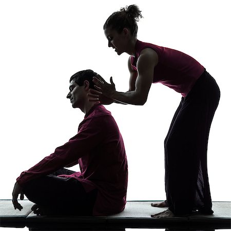 full body massage - one man and woman performing thai massage in silhouette studio on white background Foto de stock - Super Valor sin royalties y Suscripción, Código: 400-07218968
