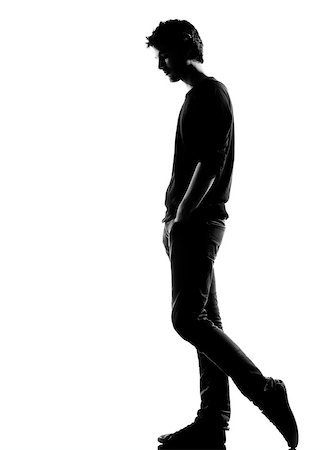 simsearch:400-06794896,k - young man sad walking silhouette in studio isolated on white background Stock Photo - Budget Royalty-Free & Subscription, Code: 400-07219011