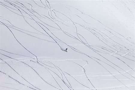 simsearch:400-08780271,k - Snowboarder downhill on off piste slope with newly-fallen snow. Caucasus Mountains, Georgia, ski resort Gudauri. Photographie de stock - Aubaine LD & Abonnement, Code: 400-07219030