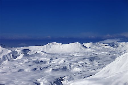 simsearch:400-04922906,k - Snowy plateau and off-piste slope at sun day. Caucasus Mountains, Georgia, ski resort Gudauri. Stockbilder - Microstock & Abonnement, Bildnummer: 400-07219033