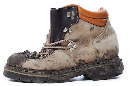 extreme terrain - Old dirty hiking boot isolated on white background Foto de stock - Super Valor sin royalties y Suscripción, Código: 400-07219074