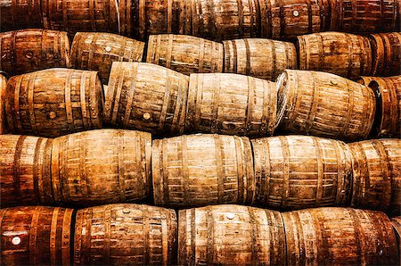 Stacked pile of old whisky and wine wooden barrels in vintage style Photographie de stock - Aubaine LD & Abonnement, Code: 400-07219249