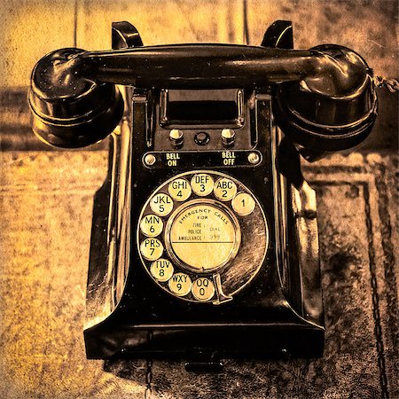 Detail monochrome view of old vintage dial telephone on the table Stock Photo - Budget Royalty-Free & Subscription, Code: 400-07219258