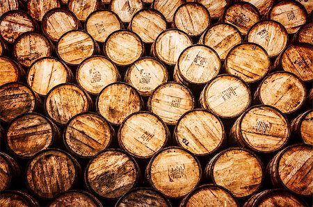 Detail view of stacked whisky and wine wooden barrels in vintage style Stockbilder - Microstock & Abonnement, Bildnummer: 400-07219259