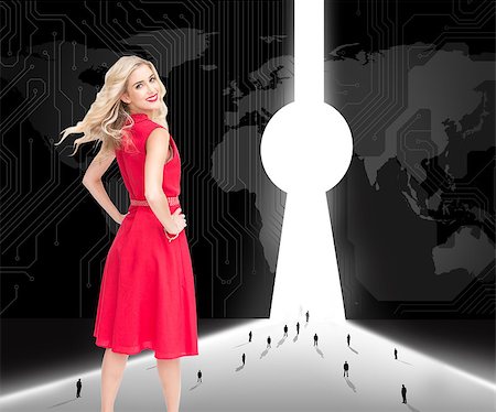 people walking to earth - Composite image of smiling attractive blonde turning Stock Photo - Budget Royalty-Free & Subscription, Code: 400-07219834