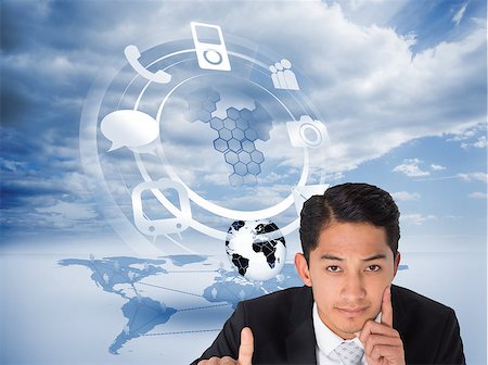 Composite image of thoughtful asian businessman pointing Stock Photo - Budget Royalty-Free & Subscription, Code: 400-07219931