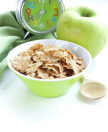 simsearch:400-04626602,k - healthy breakfast - muesli and apple (alarm clock in the background) Stock Photo - Budget Royalty-Free & Subscription, Code: 400-07210057